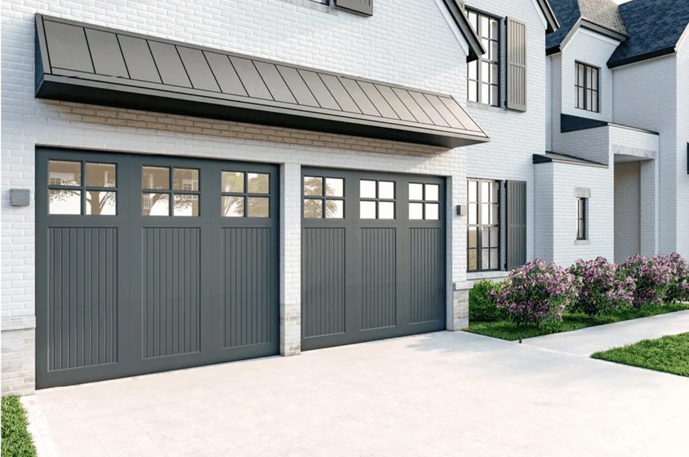 Cream carriage garage door with decorative hardware
