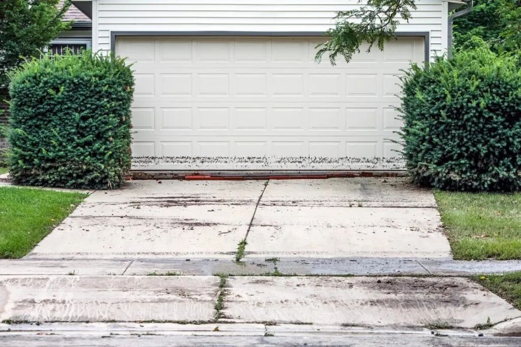 Garage door with visible water staining after flooding
