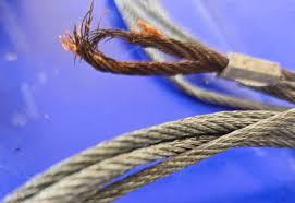 Frayed garage door cable strands