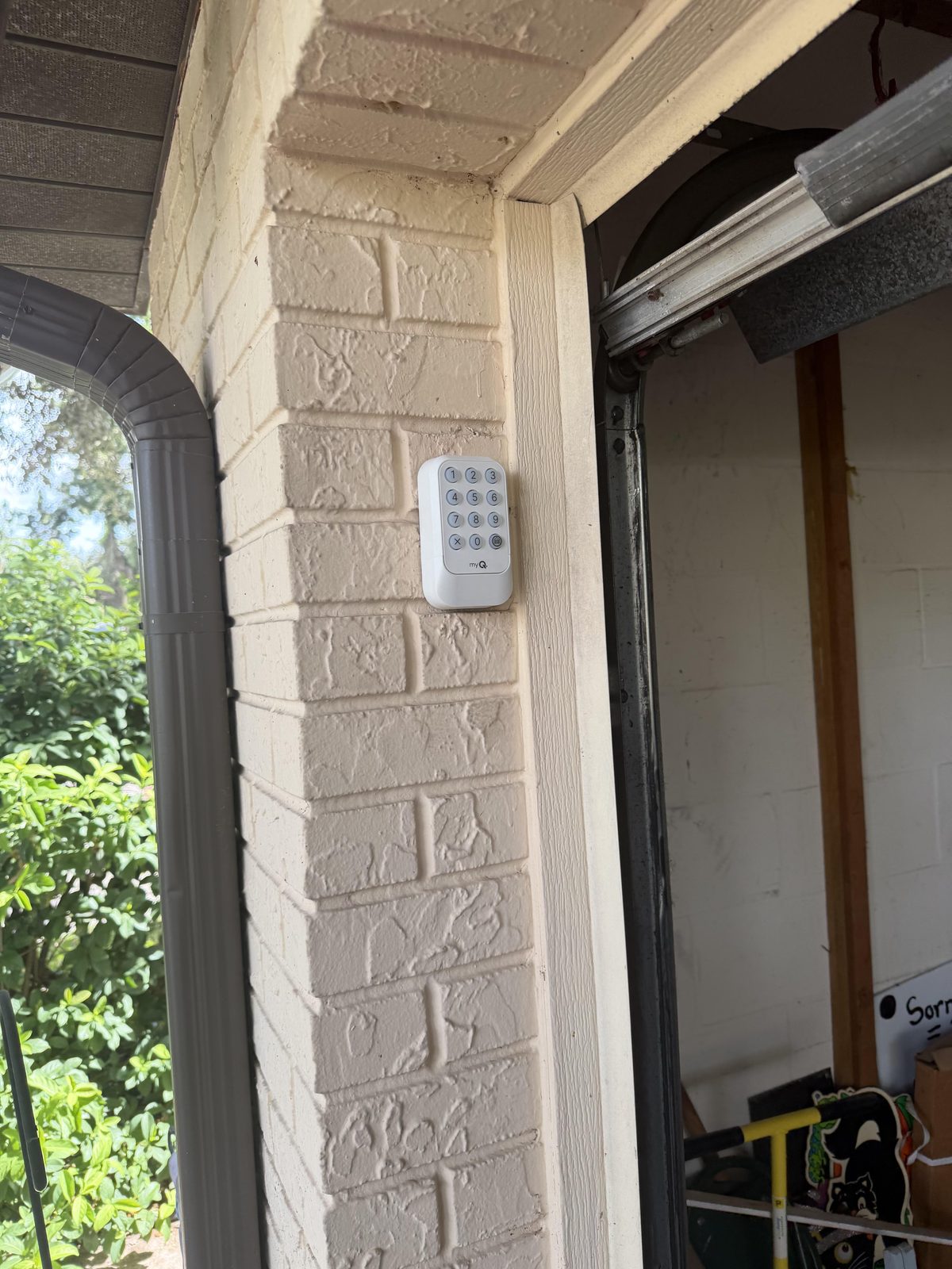 MyQ wireless keypad installed on garage