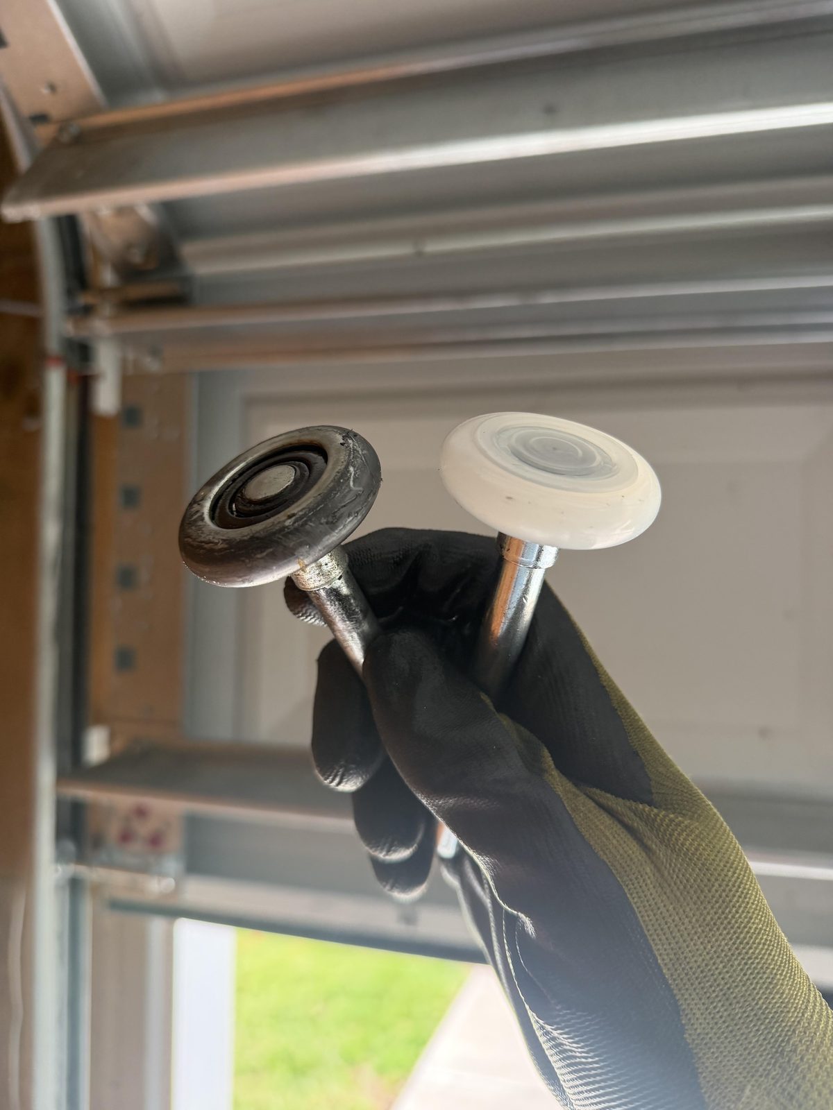 Old versus new garage door roller comparison